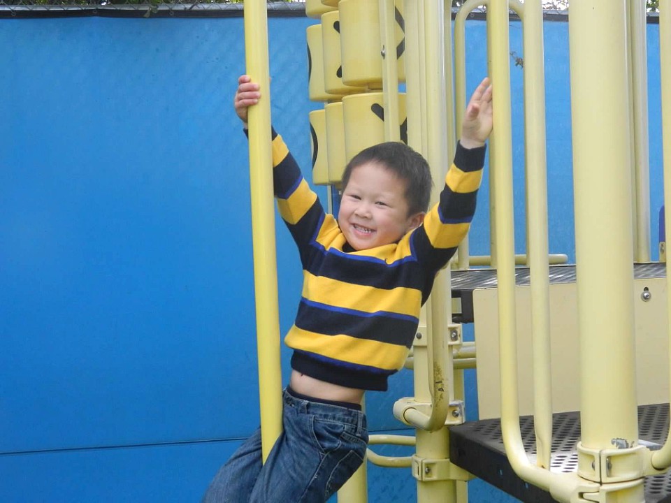 a boy playing in the playing area